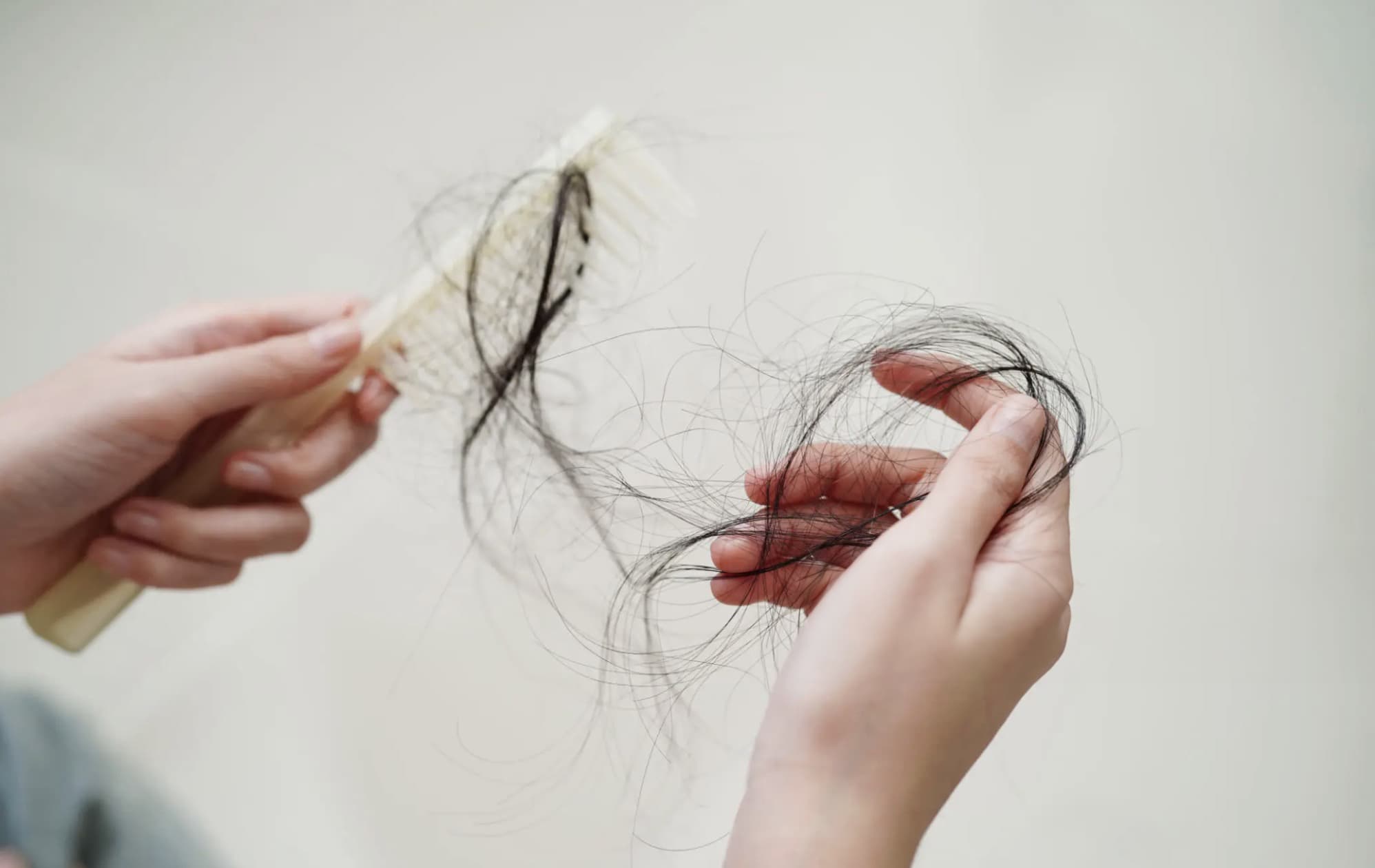 Tecken på kvinnligt håravfall